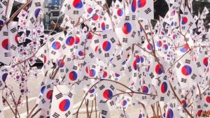 Korean flags in Seoul. Photo: Michael Howe-Ely, Flickr