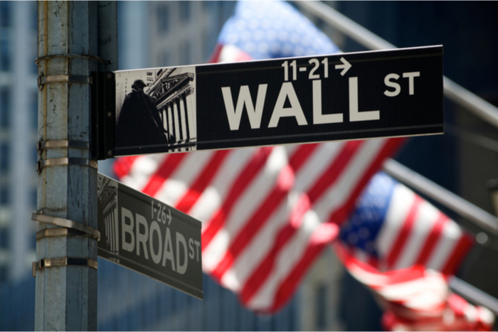 US flag flying on Wall Street