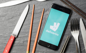 Deliveroo logo on a smartphone screen