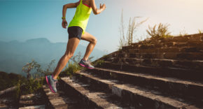 Woman running up steps