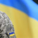 Ukrainian soldier and flag