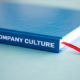 Book marked "company culture"