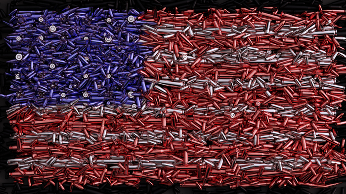 US flag formed out of bullets